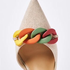 Colorful chain strap detail Recycled Linen.    Heel Height: 4"
Elastic Strap